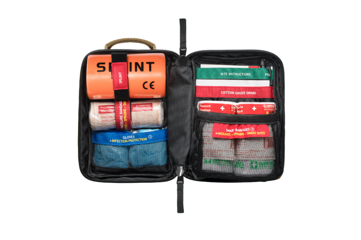 Open view of Snake Bite Kit showing SMART Bandage, compression bandages, and medical contents